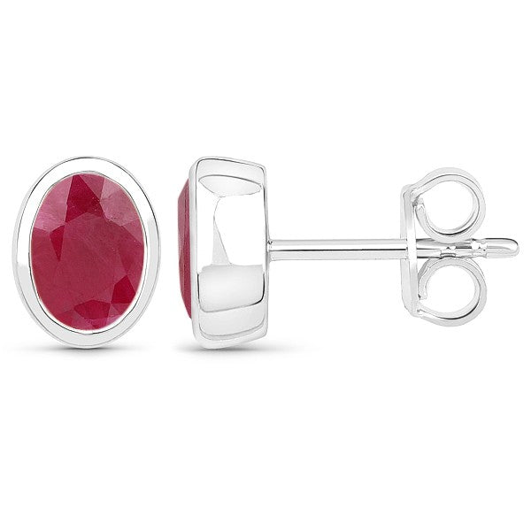 9 carat White Gold 7x5mm Oval Burmese Ruby Bezel Set Stud Earrings