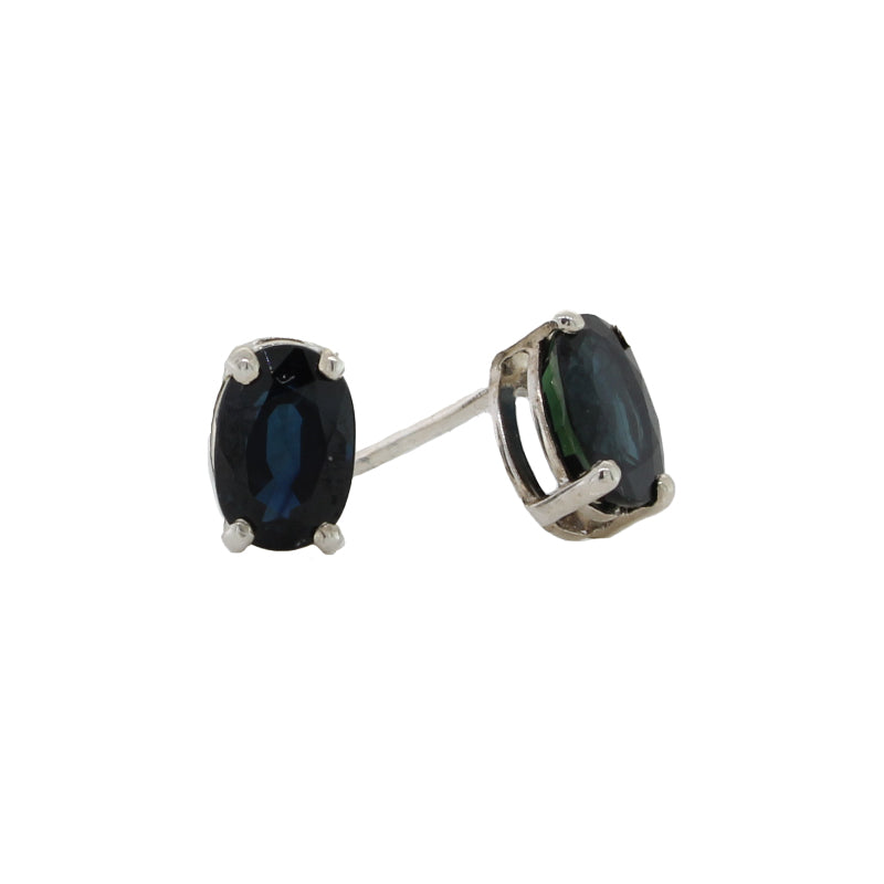 Sterling Silver 6mm x 4mm Dark Blue Oval Sapphire Stud Earrings - 4-Claw Set