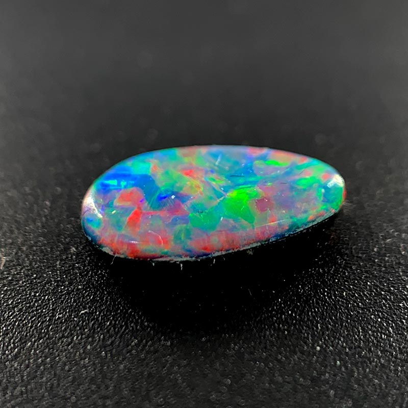 Opal Doublet Freeform Pear Shape Red Orange Blue, Green Colours 8.91mm x 5.15mm x 2.49mm Deep