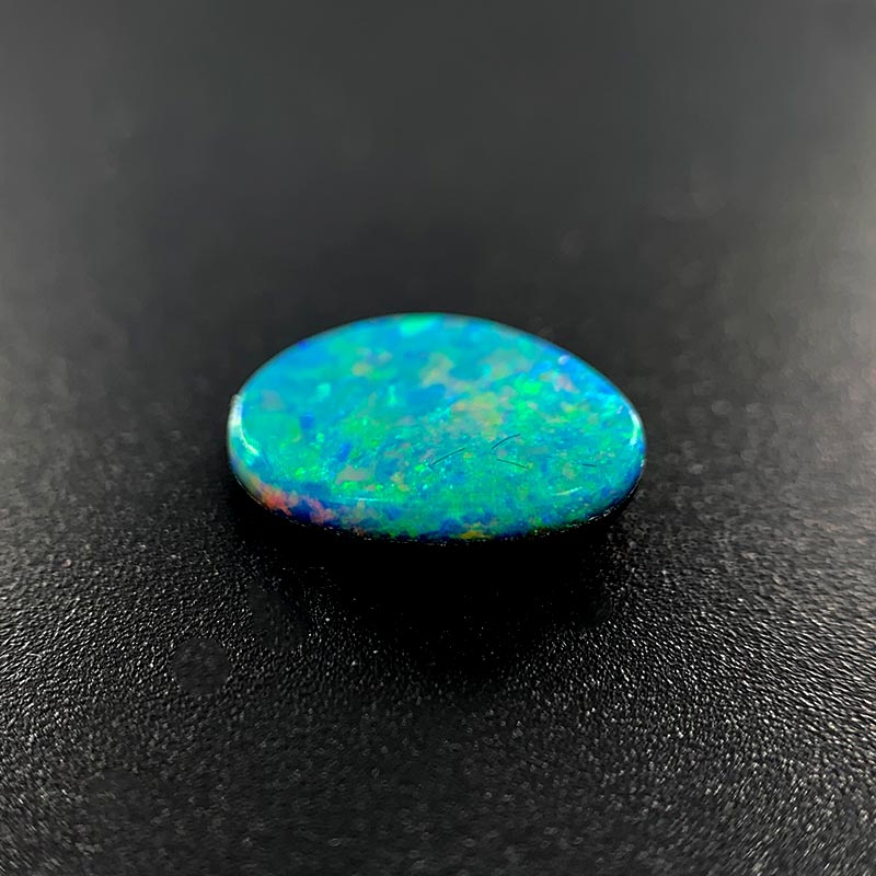 Opal Doublet Freeform Oval / Pear Shape Crimson, Orange, Green, Blue Colours 9.5mm x 6.92mm x 2.7mm Deep