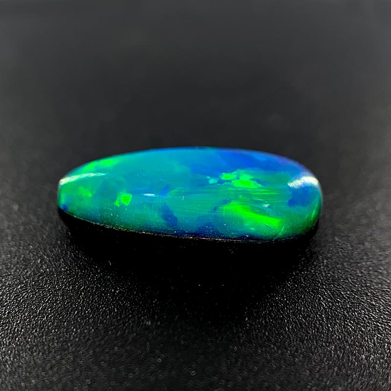 Opal Doublet Free-form Long Oval Shape Green, Blue, Orange Colours 13.05mm x 5.4mm x 3.89mm Deep