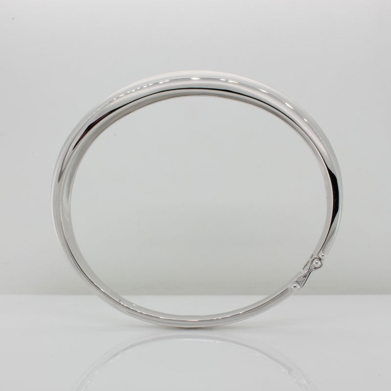 Sterling Silver Rhodium Plated Oval Hinged Bangle 10mm Wide with Center Knife Edge, 6mm Wide at Back with Figure 8 Clasp