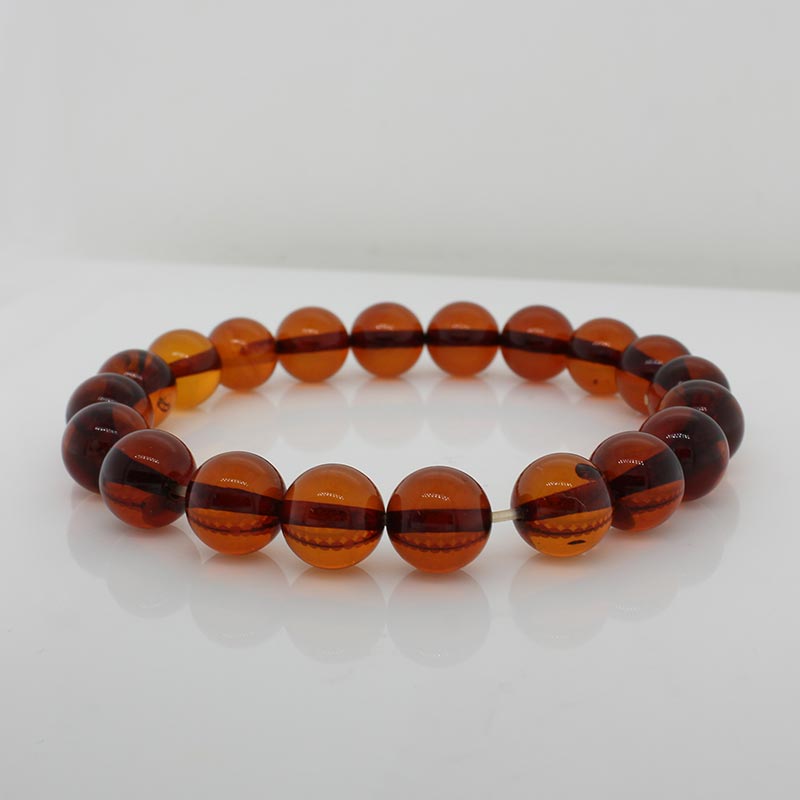 8.5mm Dark Orange Baltic Amber Bead Bracelet on Stretch Material