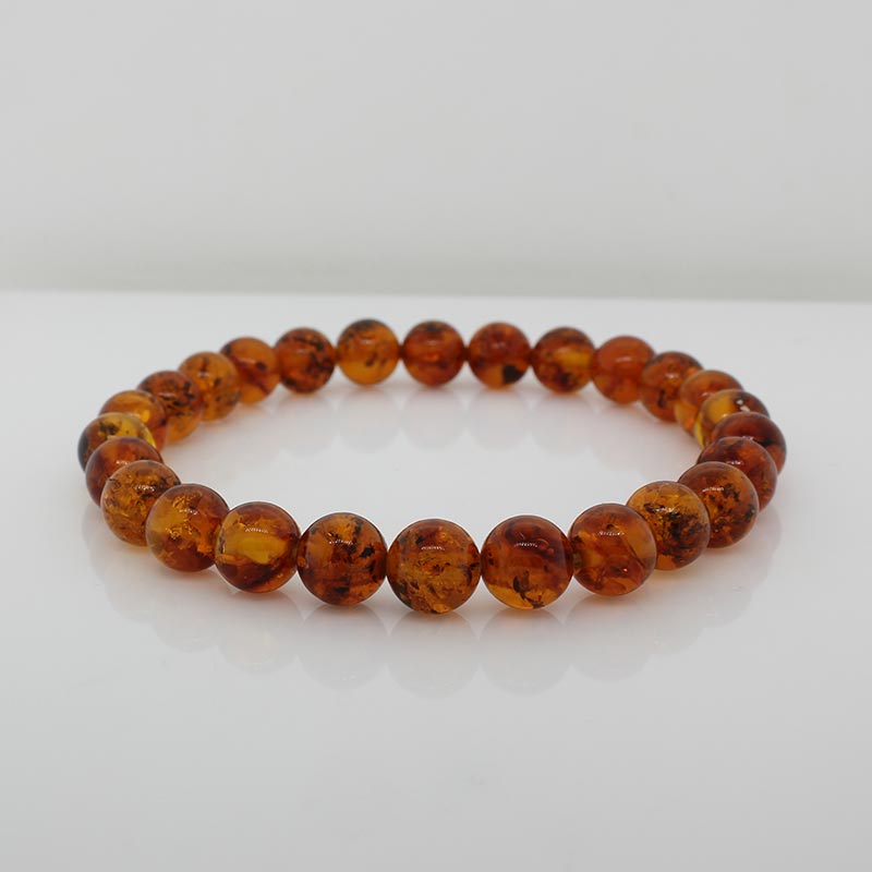 7mm Orange Baltic Amber Bead Bracelet on Stretch Material