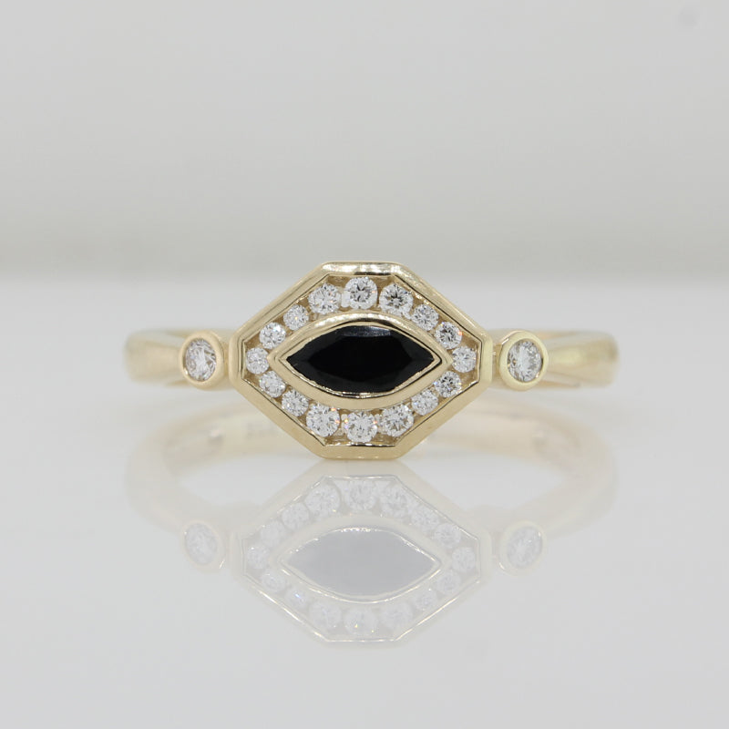 9 Carat Yellow Gold Marquise Sapphire in Diamond Halo Ring