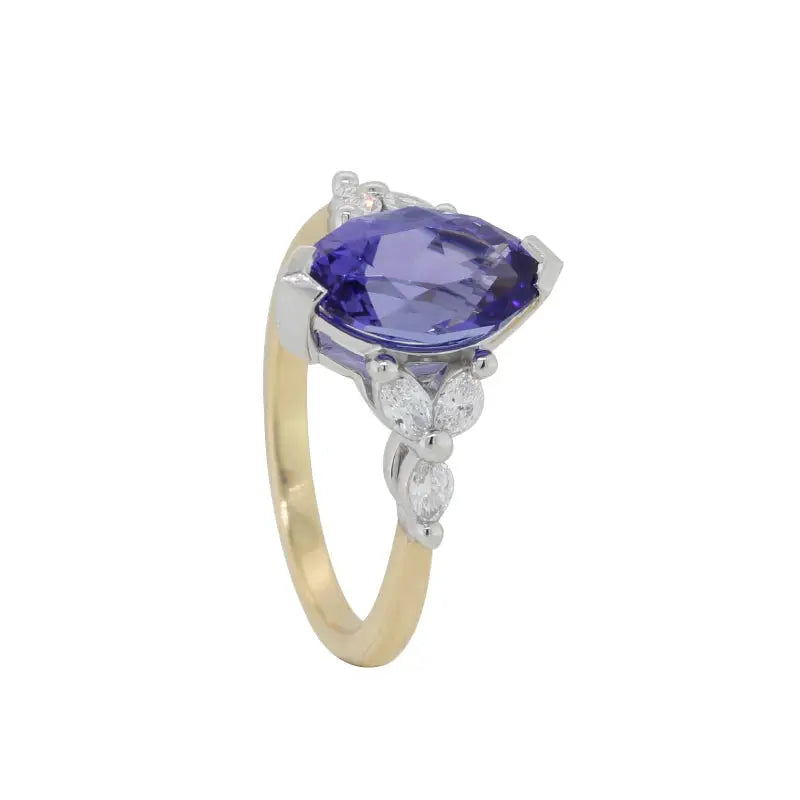 18 Carat Yellow and White Gold Marquise cut Tanzanite and Marquise Diamond Ring 