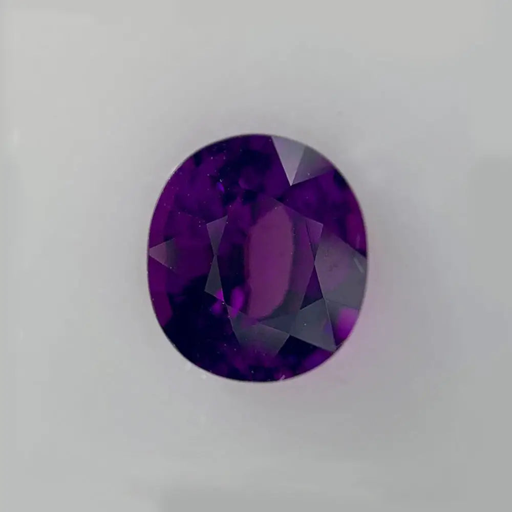 9 Carat Rose and White Gold Purple Garnet and Diamond Ring