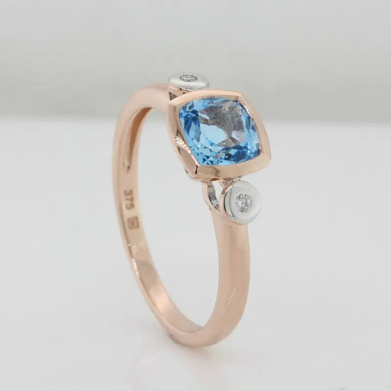 9 Carat Rose Gold Blue Topaz & Diamond Dress Ring 