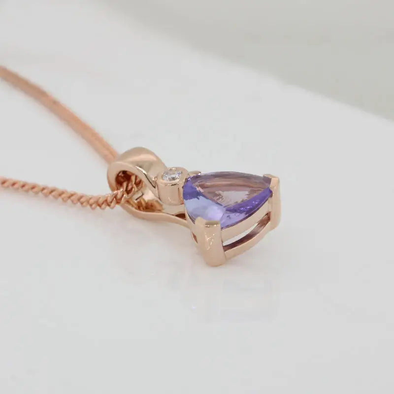 9 Carat Rose Gold Tanzanite Trilliant Cut and Diamond Pendant