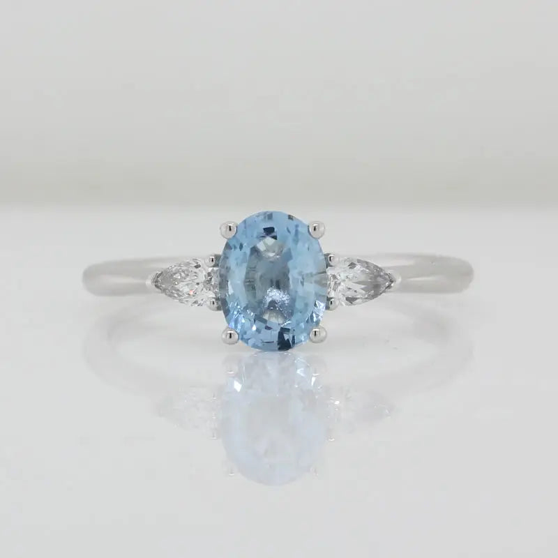 9 Carat White Gold Aquamarine Oval 6.9x5.3mm 0.70ct Mid-Blue and Diamond Ring