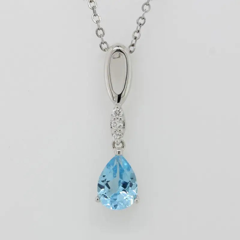 9 Carat White Gold Blue Topaz and Diamond Pendant