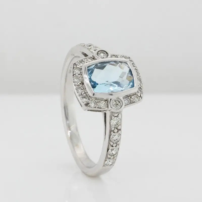 9 Carat White Gold  Blue Topaz & Diamond Ring