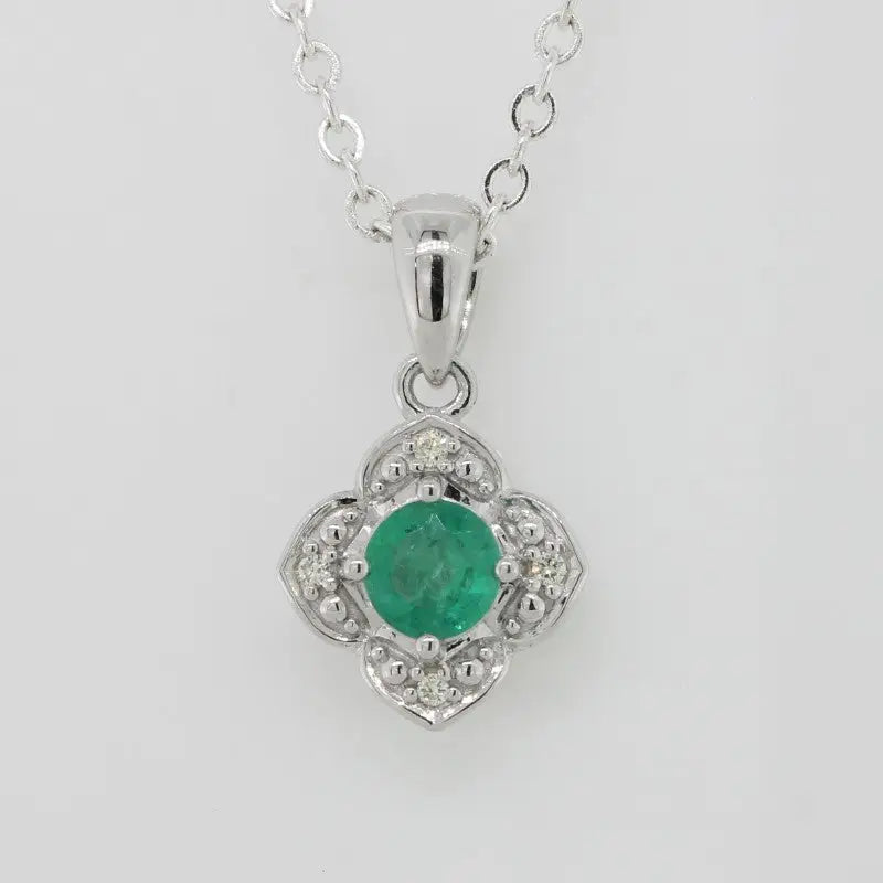 9 Carat White Gold Emerald & Diamond Pendant