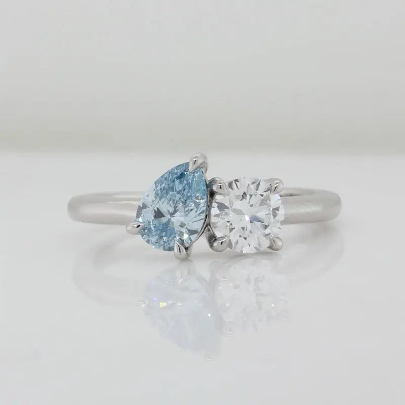 9 Carat White Gold Lab Grown Pear 0.61ct Fancy Blue VVS2 and Lab Grown 0.60ct Diamond Ring