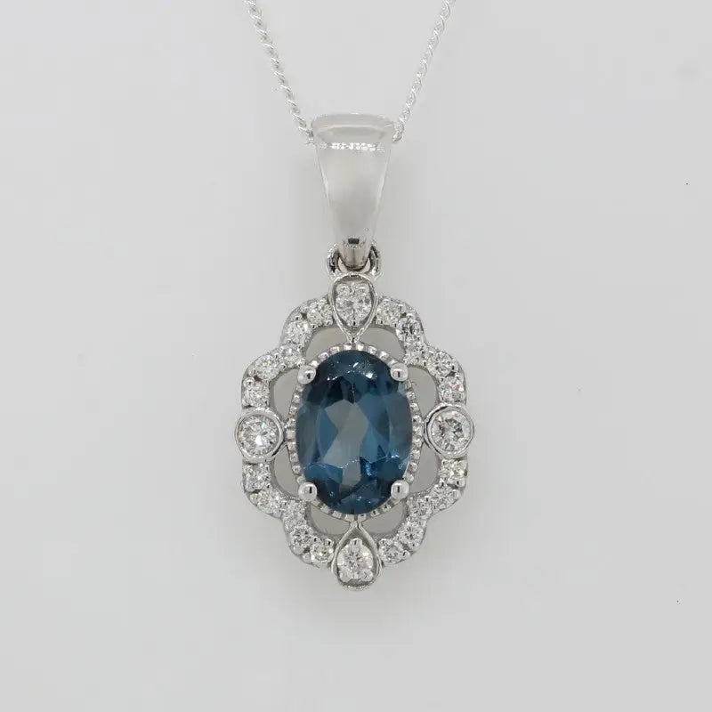 9 Carat White Gold London Blue Topaz 0.18 Carat Diamonds