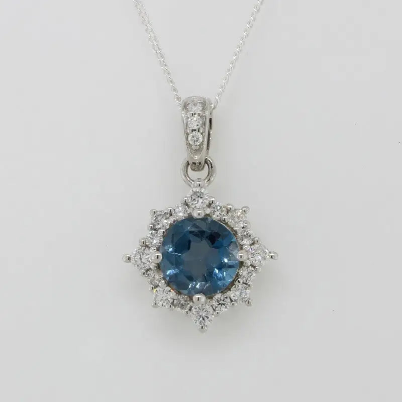 9 Carat White Gold London Blue Topaz 0.25Carat Diamonds Pendant