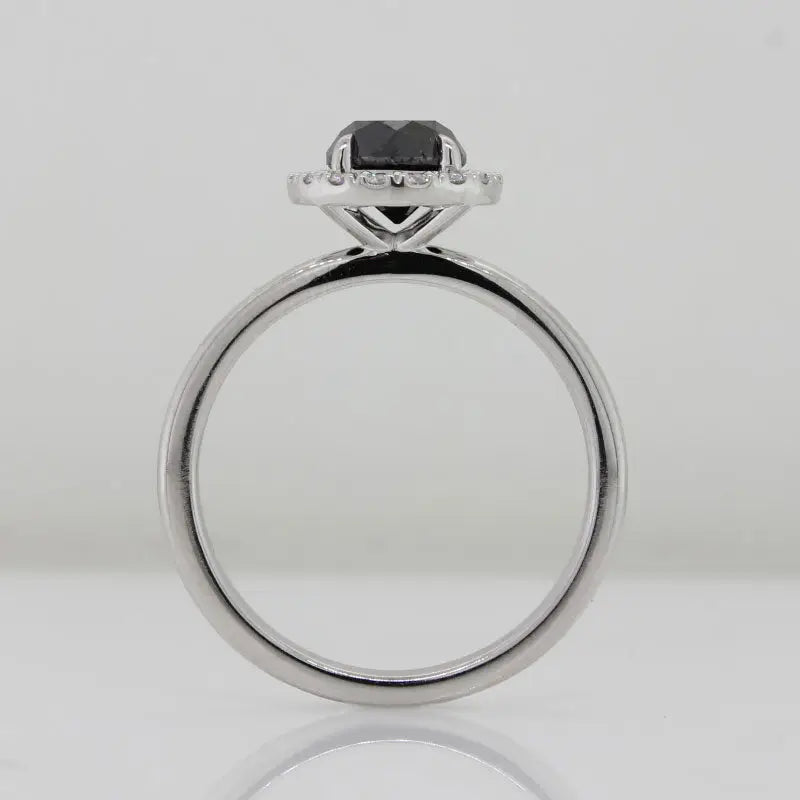 9 Carat White Gold Natural Black Round Brilliant Cut Diamond with a Halo of Diamonds Ring