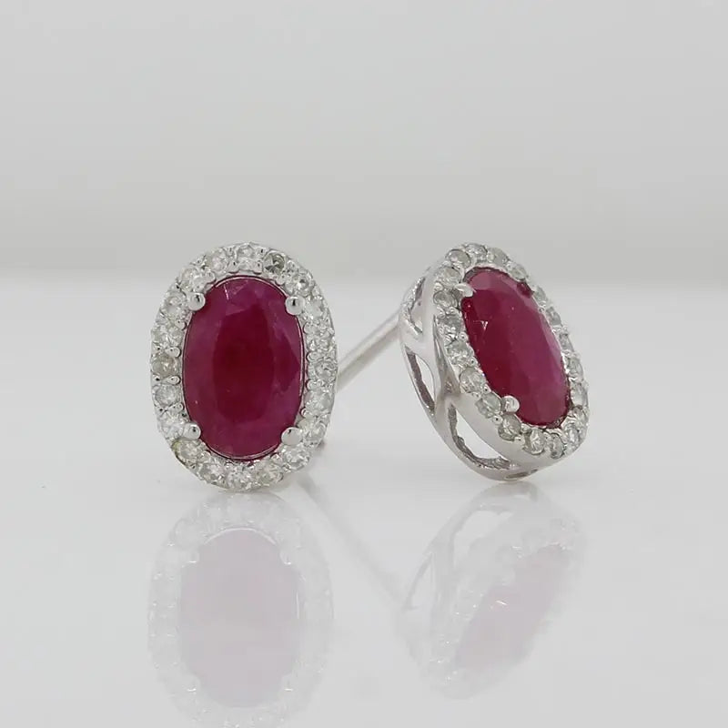 9 Carat White Gold Natural Ruby and Diamond TDW 0.156 Carat Oval Ruby & Diamond Halo Stud Earrings