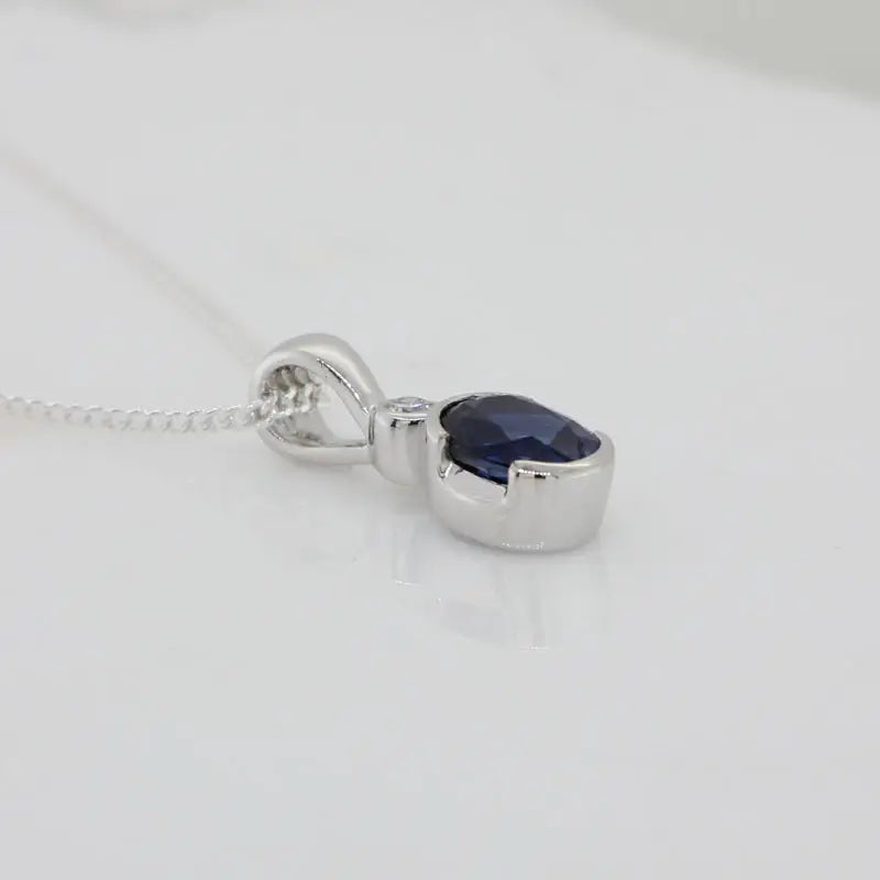 9 Carat White Gold Sapphire & Diamond Pendant