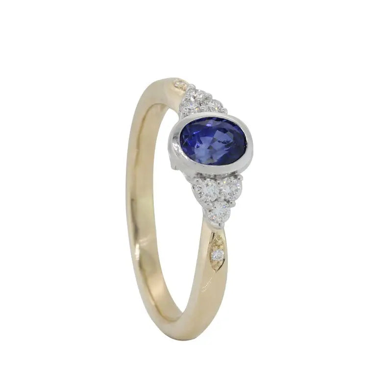 9 Carat Yellow and White Gold Sapphire and Diamond Ring