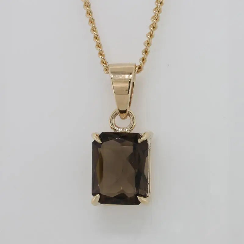 9 Carat Yellow Gold 10mm x 8mm Emerald Shape 2.67 Carat Smoky Quartz Handmade Pendant