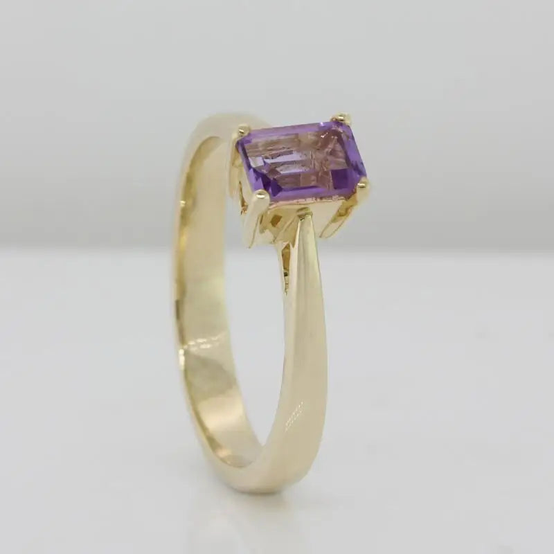 9 Carat Yellow Gold 6mm x 4mm Emerald Cut Amethyst Solitaire Ring Size N