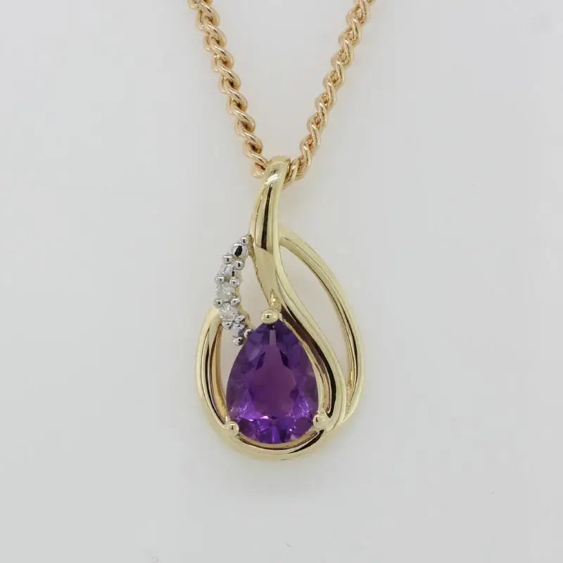 9 Carat Yellow Gold  Pear Shape Amethyst & Diamond Pendant Total Diamond Weight 0.01 carat 