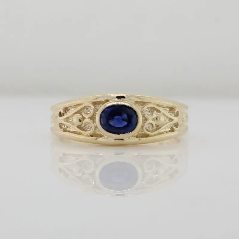 9 Carat Yelow Gold Oval Sapphire Ring