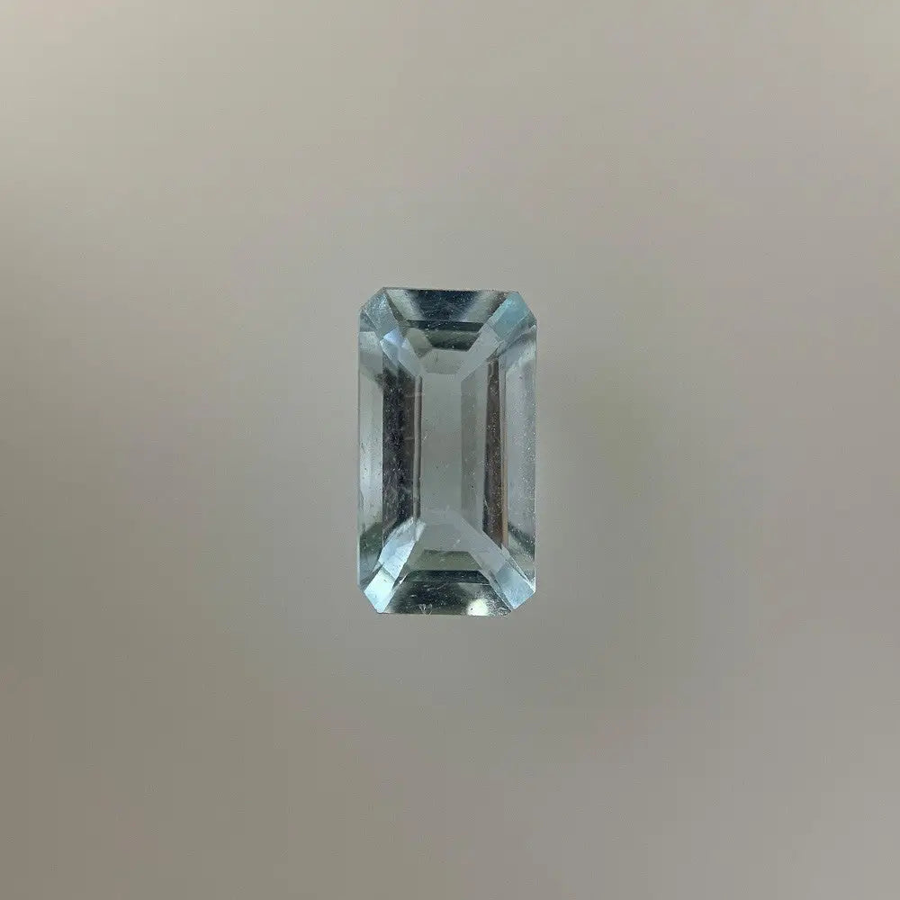 9ct White Gold Aquamarine Emerald Cut 7.9x4.3mm 0.72ct Light Blue and Diamond Ring