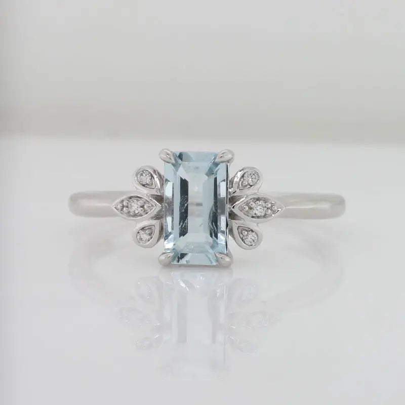 9ct White Gold Aquamarine Emerald Cut 7.9x4.3mm 0.72ct Light Blue and Diamond Ring