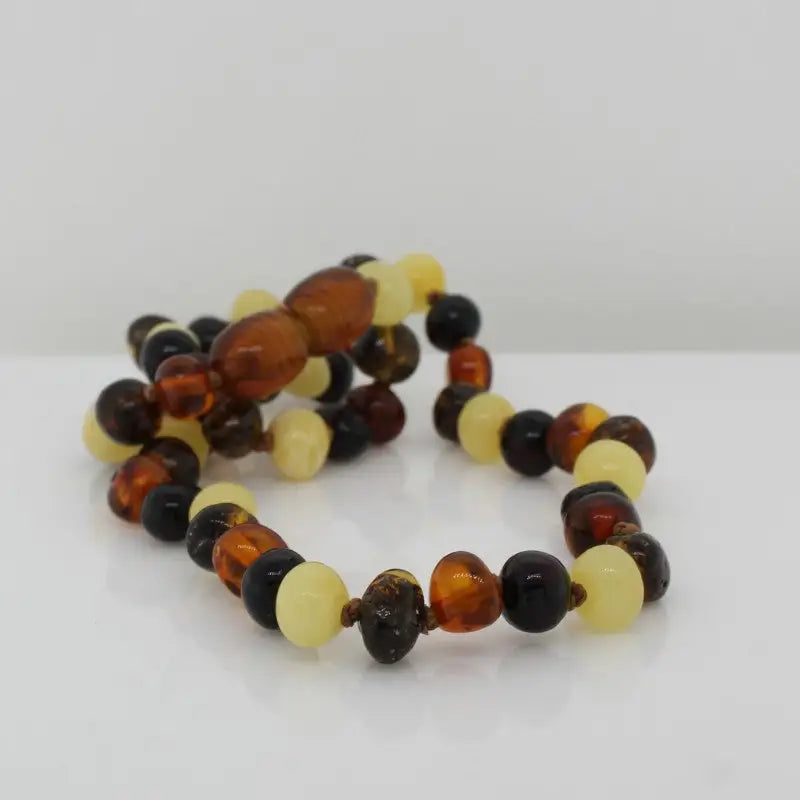 Childrens Baltic Amber Bead Necklet 30cm Knotted Strand Yellow Orange Black with Amber Invisible Clasps