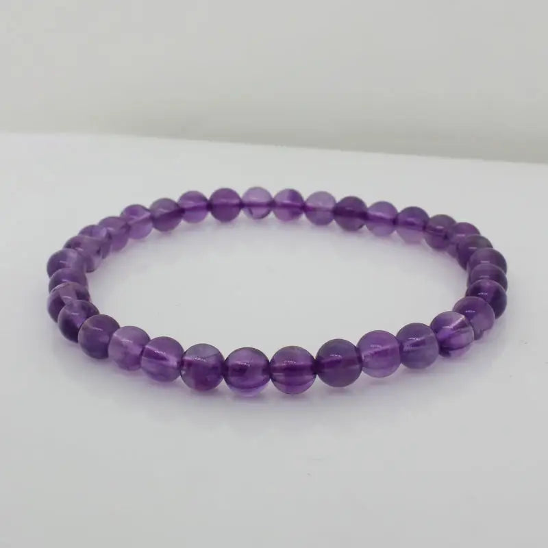 Elastic Amethyst Bracelet  - 34 x 6mm Round Beads