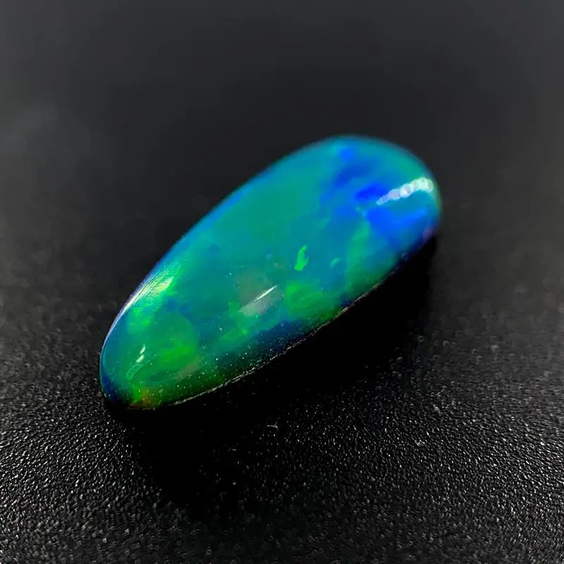 Opal Doublet Free-form Long Oval Shape Green, Blue, Orange Colours 13.05mm x 5.4mm x 3.89mm Deep