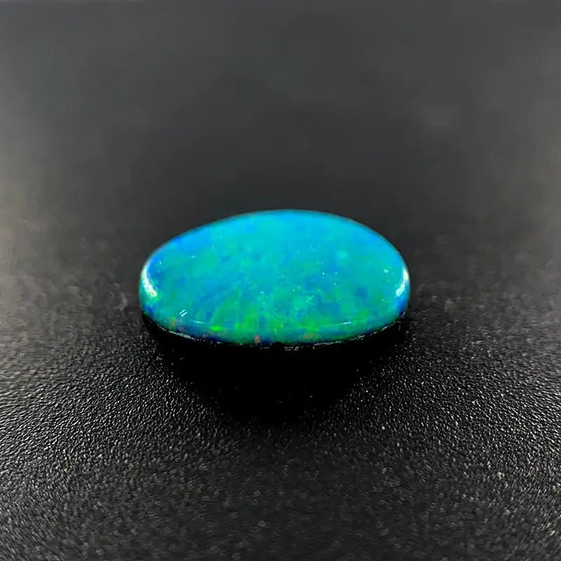 Opal Doublet Freeform Oval Shape Green, Blue, Faint Orange Colours 9.7mm x 7mm x 2.6mm Deep