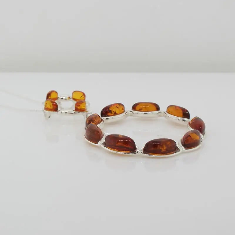 Sterling Silver 2 x Circle Amber Pendant Seaspray Valuations