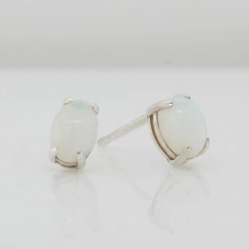 Sterling Silver 6mm x 4mm Oval White Crystal Opal 4 Claw Stud Earrings